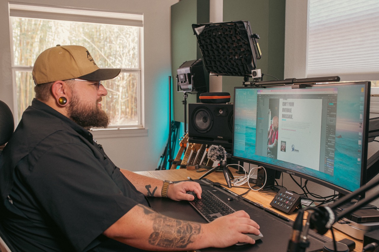 Shawn Papineau working at his desk in the Sudo Create studio